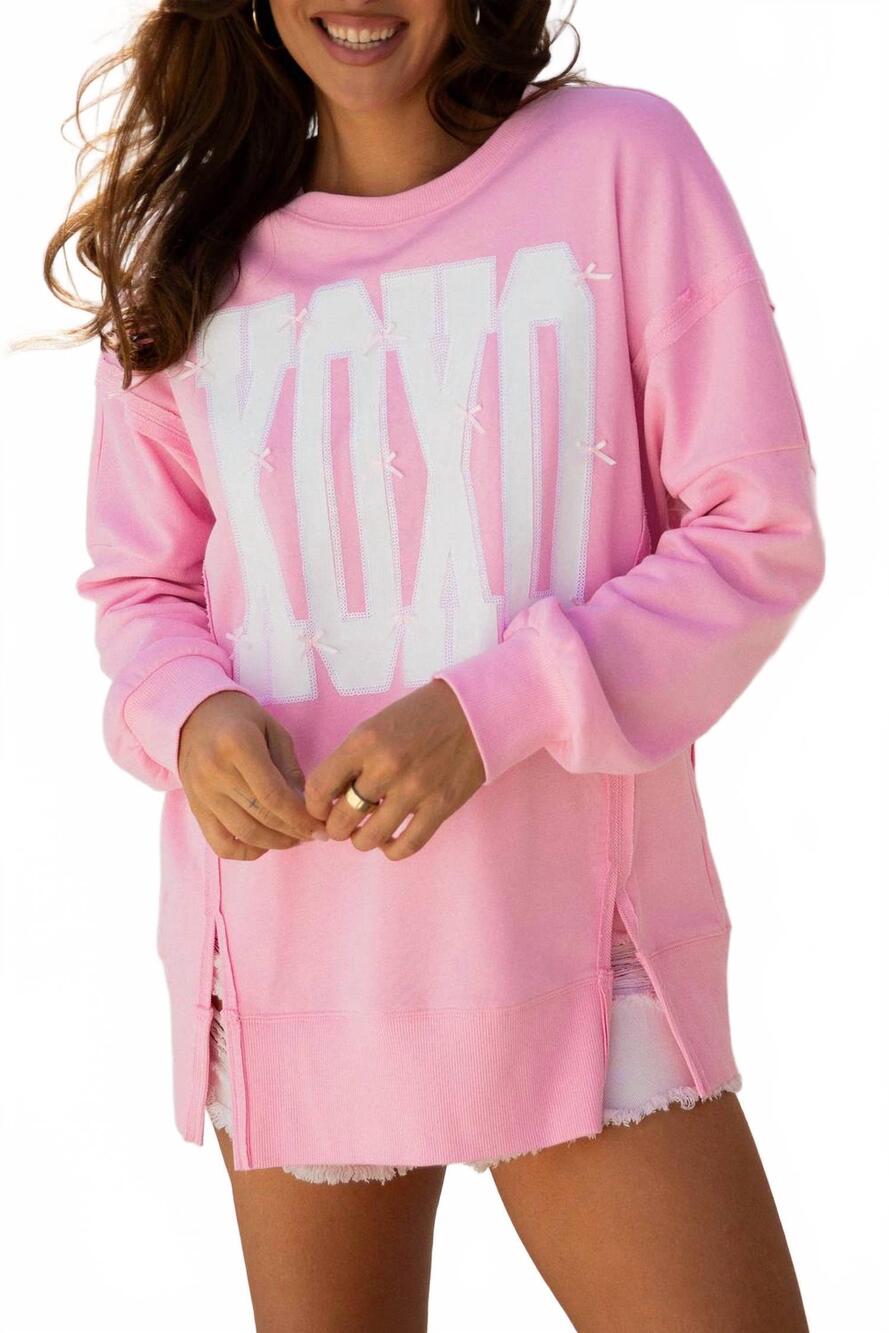 NEW 66DISCO xoxo bow sequin sweater in pink